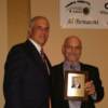 Ramiiro Ortiz accepting award with FBHOF President Butch Flansburg
Photo by Tom Sisson